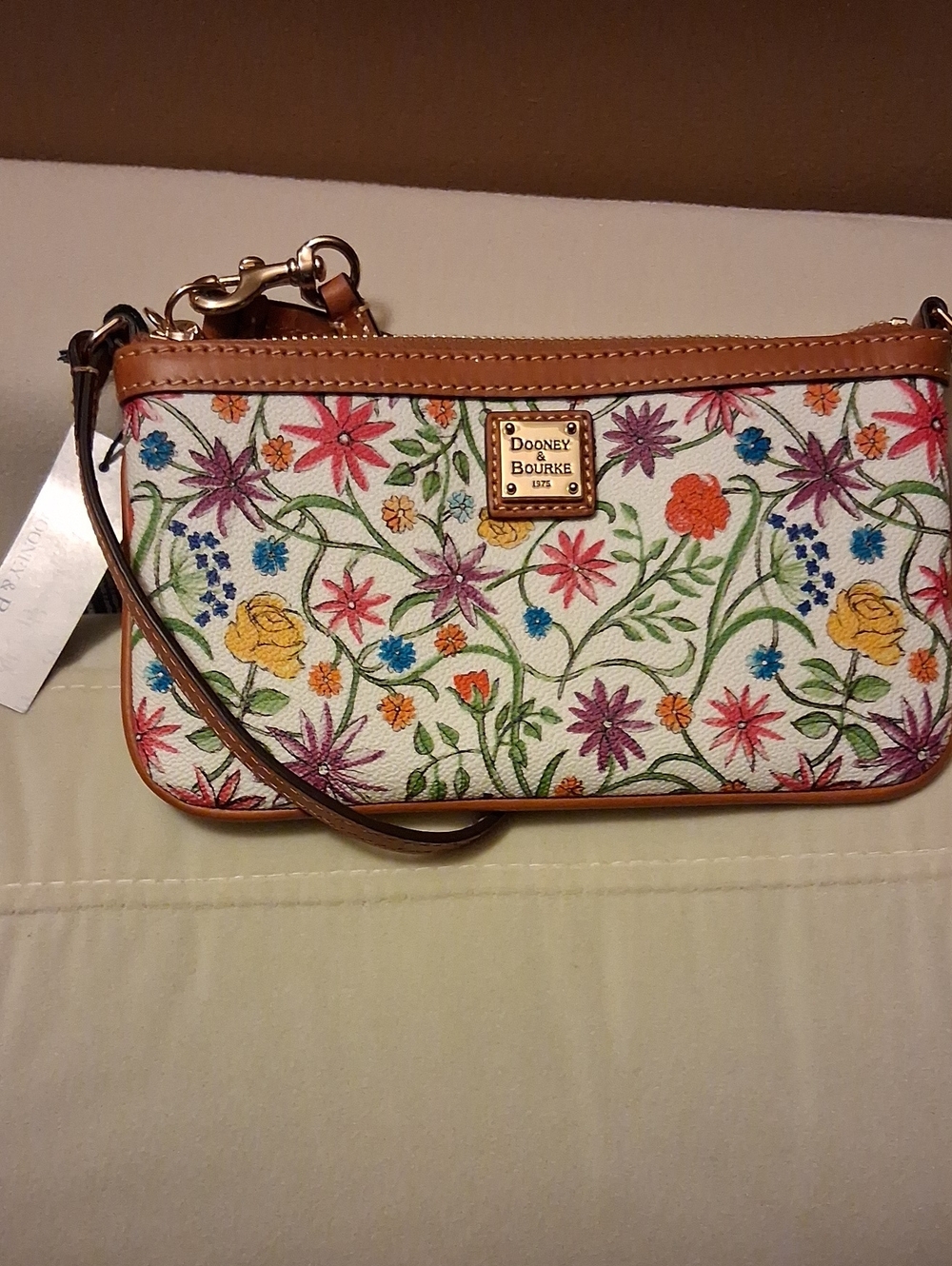 Dooney & Bourke White Floral Embroidered Wristlet with Tan Trim
